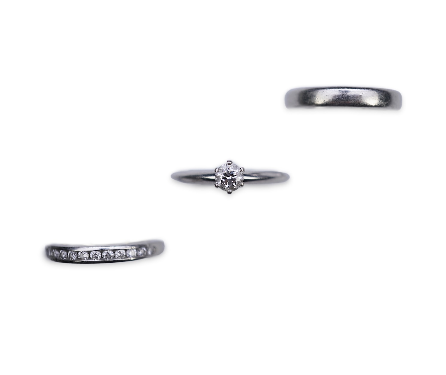 Tiffany & Co., a diamond engagement, eternity and wedding ring set